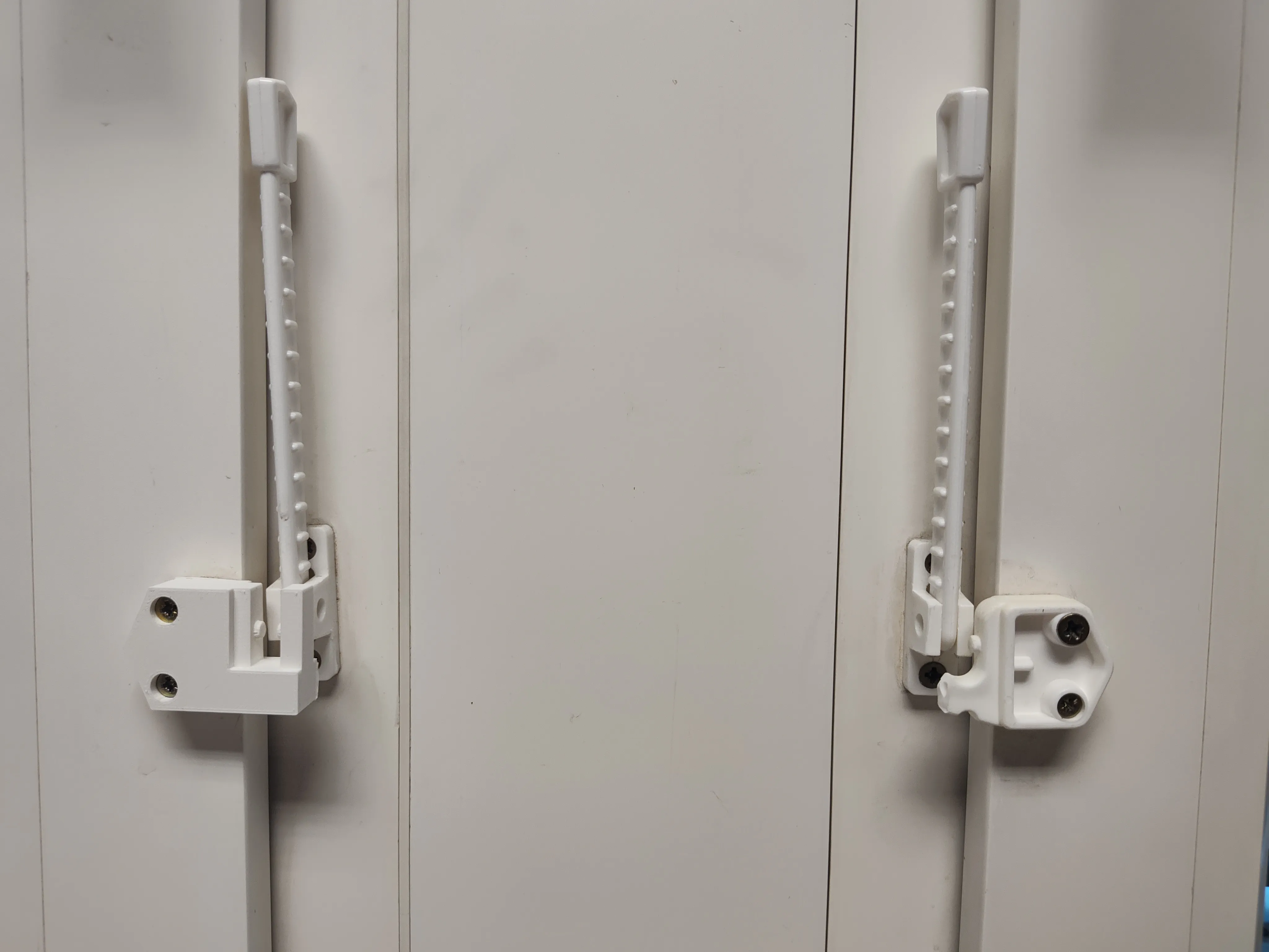 A new window holder on a left and an old, broken one on the right